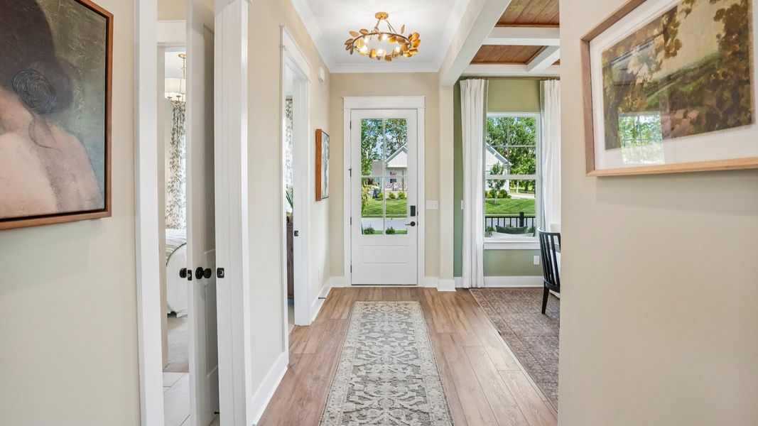 Front entryway of home with access to dedicated dining space Front entryway of home with access to dedicated dining space