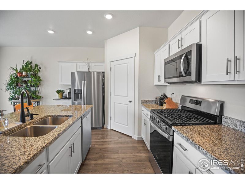 Slab granite counters, energy efficient LED lighting throughout