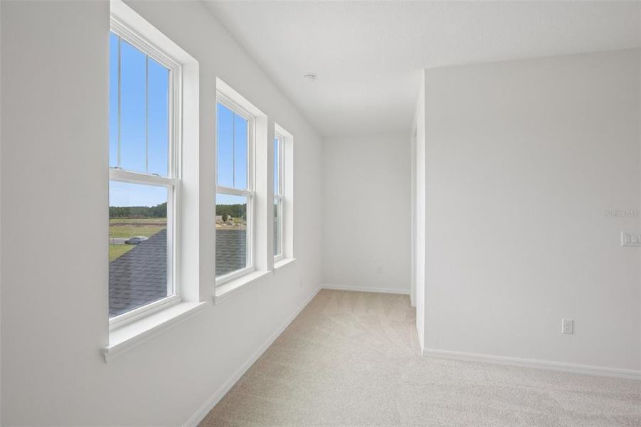 Spacious, unfurnished interior of a new home in Primrose at Longleaf, New Port Richey (Image 39).