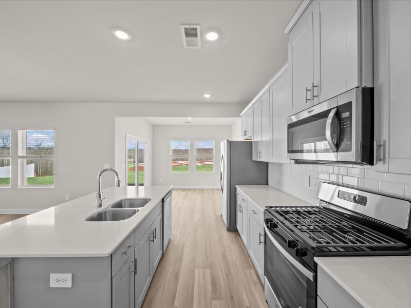 Furnished interior view inside a new home in Brayfield Manor - Heritage Collection, Wellford (Image 4).