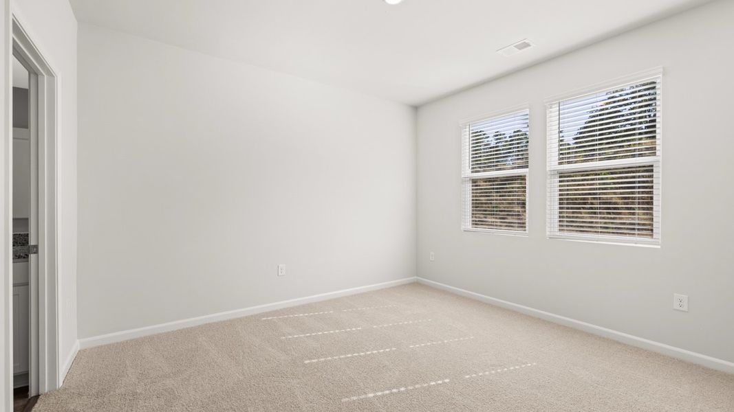 Spacious, unfurnished interior of a new home in Byrd Village, Graniteville (Image 17).