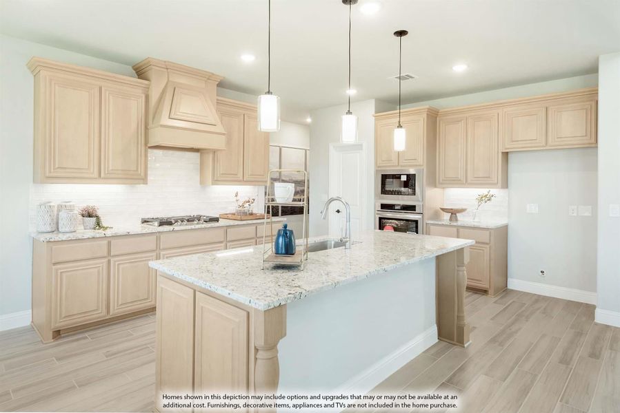 Kitchen with light wood cabinets, granite island, pendant lights, and stainless steel appliances Kitchen with light wood cabinets, granite island, pendant lights, and stainless steel appliances