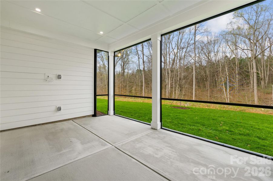Exterior details and patio area of a home in Coventry Glen, Huntersville (Image 26).
