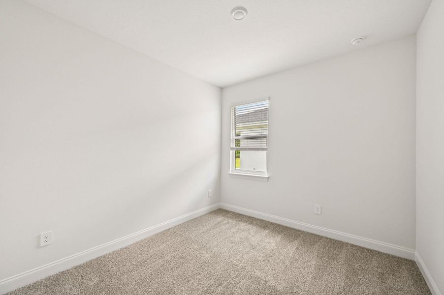 Spacious, unfurnished interior of a new home in Hampton Park - Signature Series, Vero Beach (Image 15).