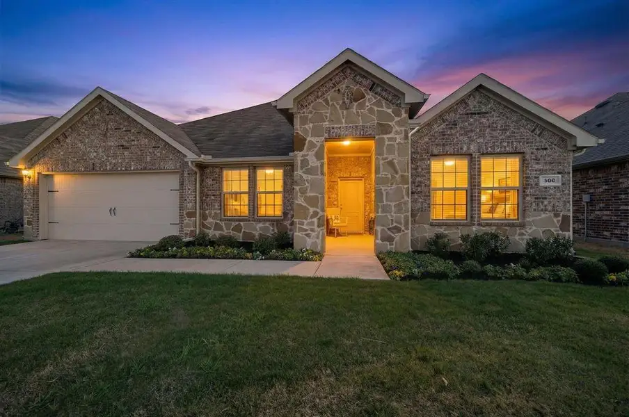 Front exterior of a new home in , Caddo Mills, TX, highlighting curb appeal (Image 2). Front exterior of a new home in , Caddo Mills, TX, highlighting curb appeal (Image 2).