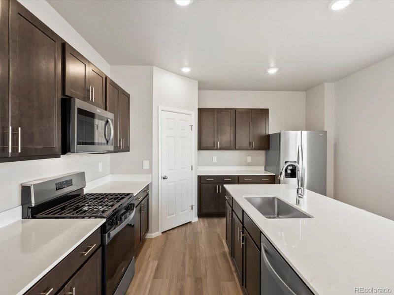 Furnished interior view inside a new home in Revere at Johnstown, Johnstown (Image 9).