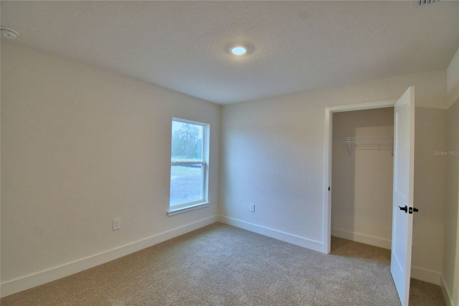 Spacious, unfurnished interior of a new home in Cadence Crossing, Auburndale (Image 40).