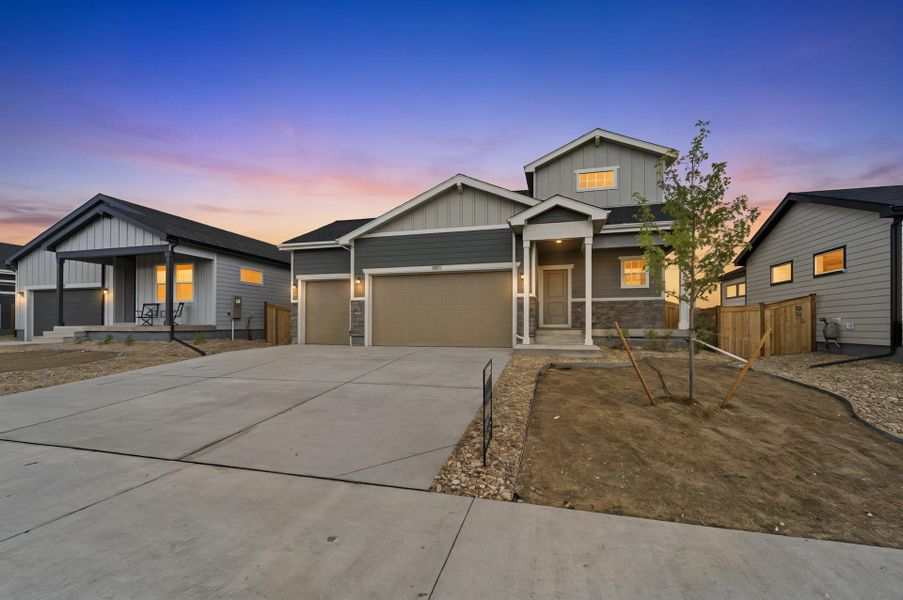 Front exterior of a new home in Granary, Johnstown, CO, highlighting curb appeal (Image 30).