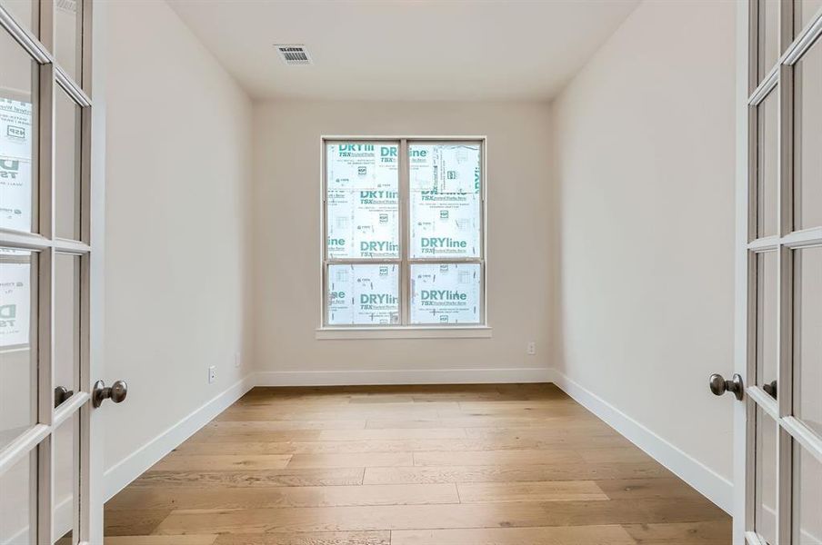 Unfurnished room featuring light hardwood / wood-style flooring