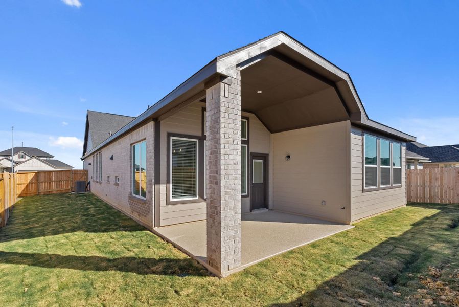 Exterior details and patio area of a home in Attwater, Waller (Image 3).