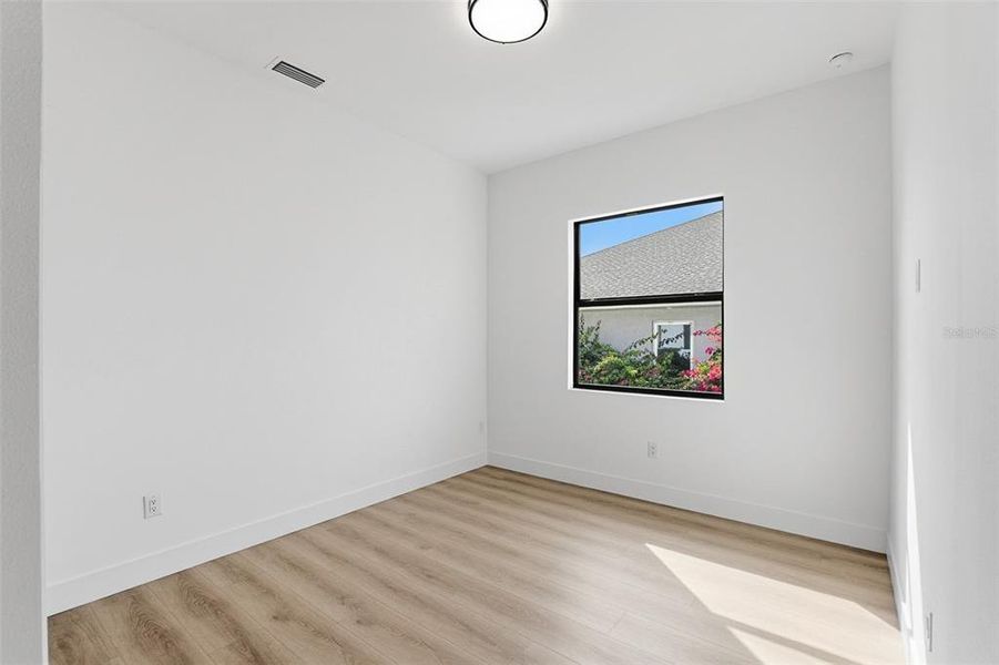 Spacious, unfurnished interior of a new home in , Port Charlotte (Image 22).