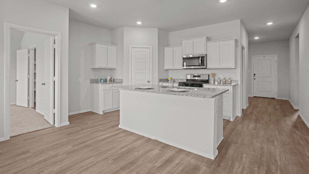 Representative furnished interior of a home built from the DENTON by D.R. Horton in Faculty Row, Abilene (Image 7).