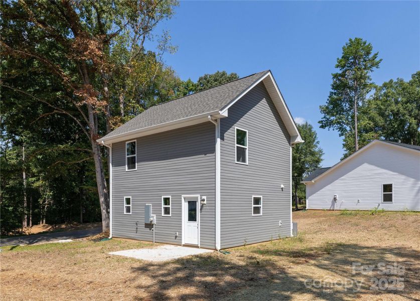 Exterior details and patio area of a home in , Mooresville (Image 20).