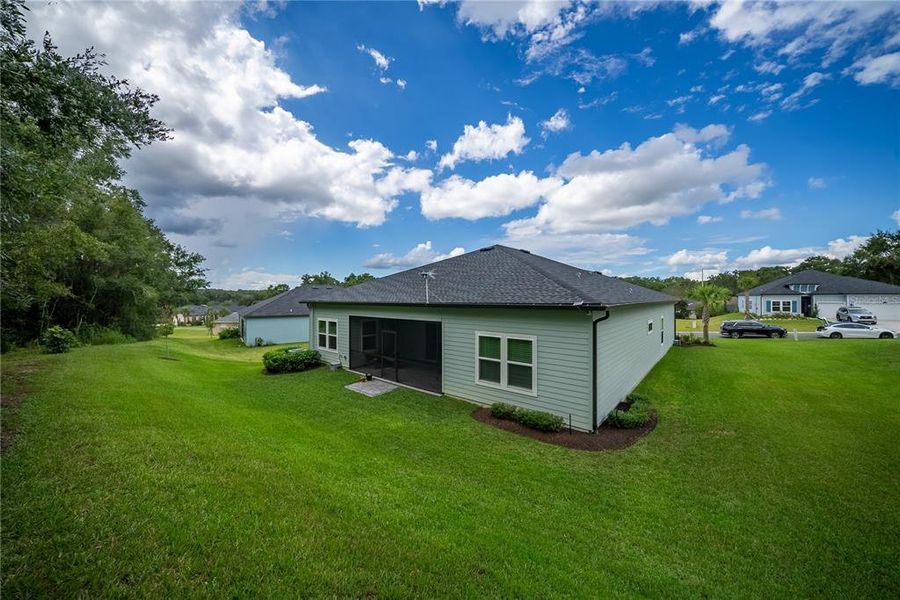 Exterior details and patio area of a home in Grand Park North, Dunnellon (Image 3).