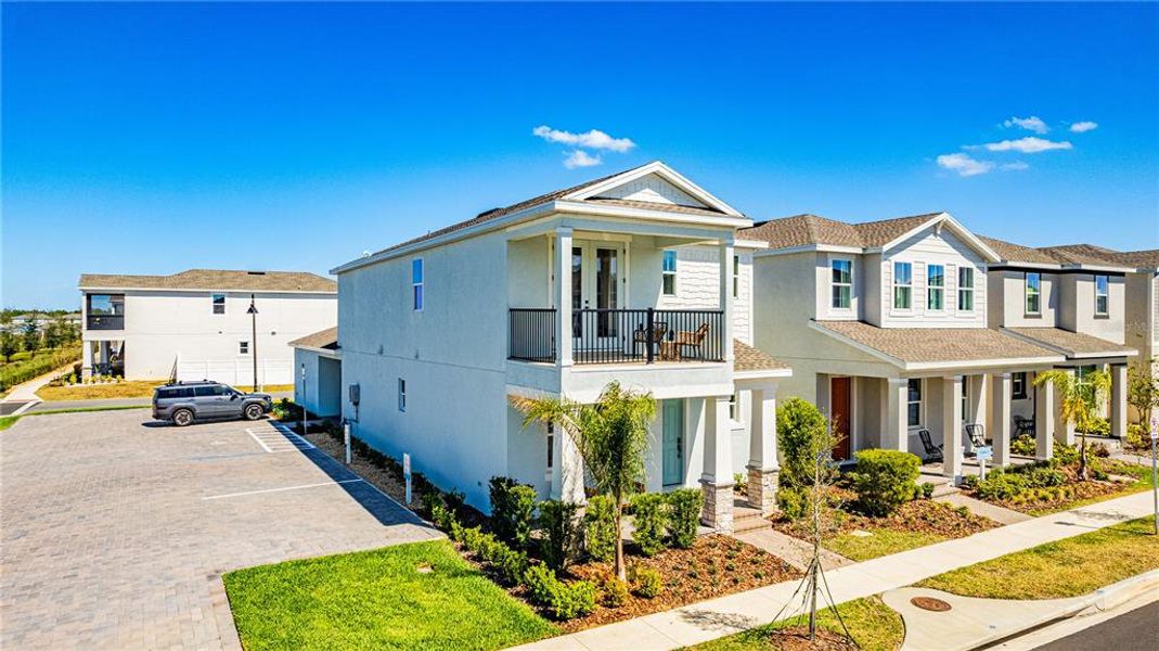 Front exterior of a new home in , Winter Garden, FL, highlighting curb appeal (Image 23). Front exterior of a new home in , Winter Garden, FL, highlighting curb appeal (Image 23).