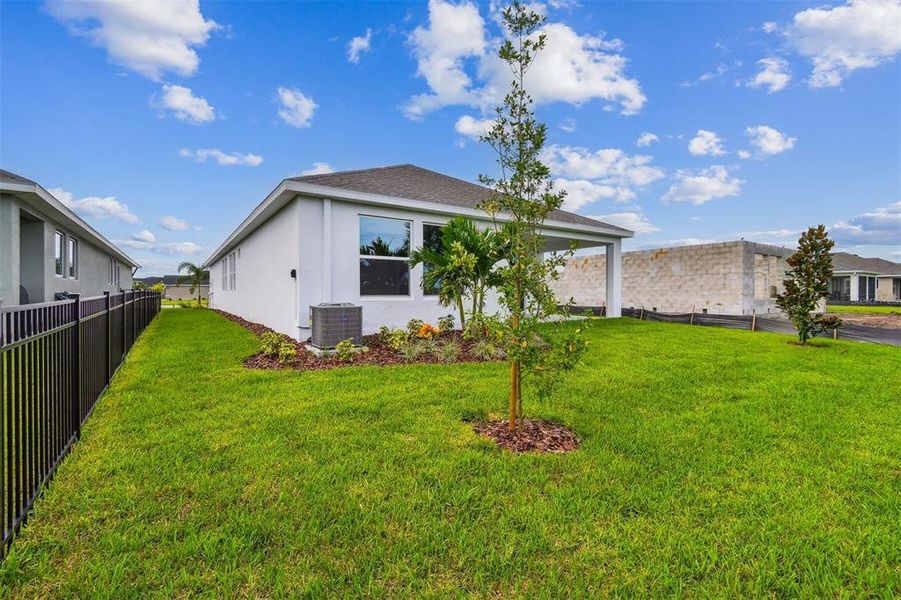 Front exterior of a new home in North River Ranch - Cottage Series, Parrish, FL, highlighting curb appeal (Image 21).