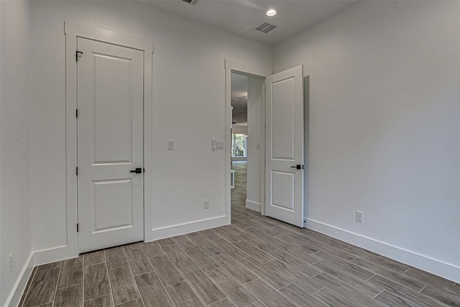Downstairs guest bedroom front of house. Downstairs guest bedroom front of house.