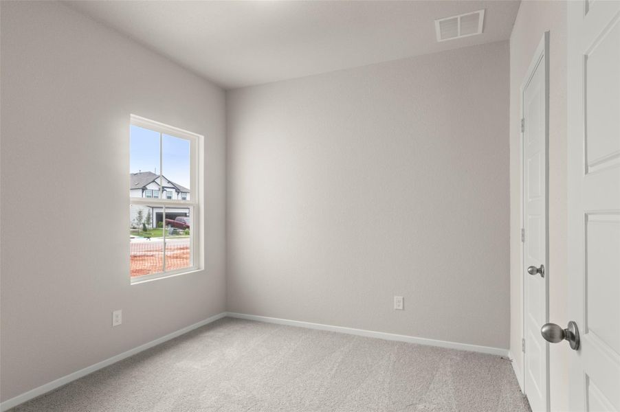 Spare room with light carpet