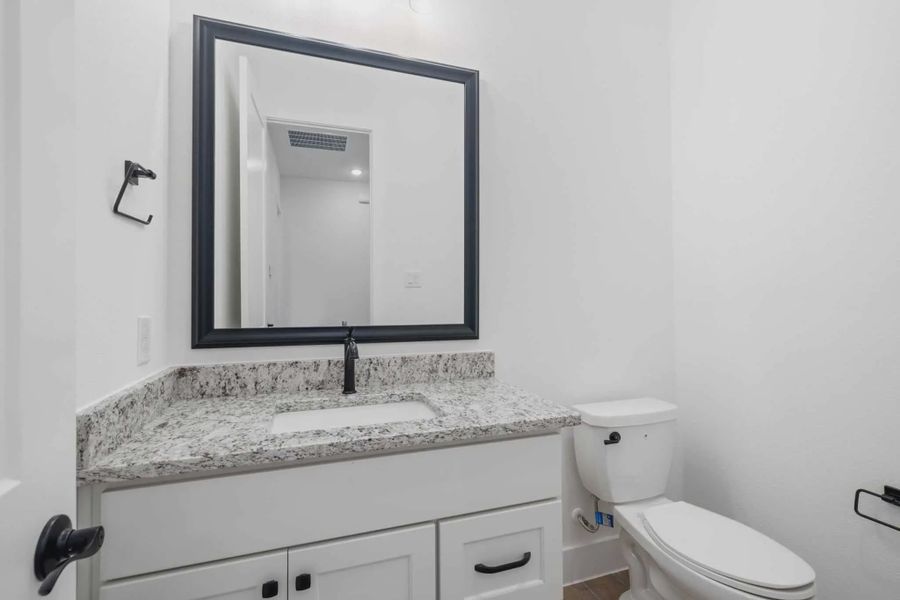 Representative furnished interior of a home built from the Malibu by Chesmar Homes in Fulshear Lakes, Fulshear (Image 12).