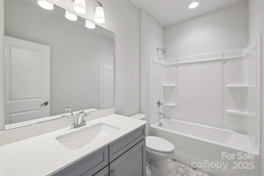Furnished interior view inside a new home in Walk23, Huntersville (Image 8).