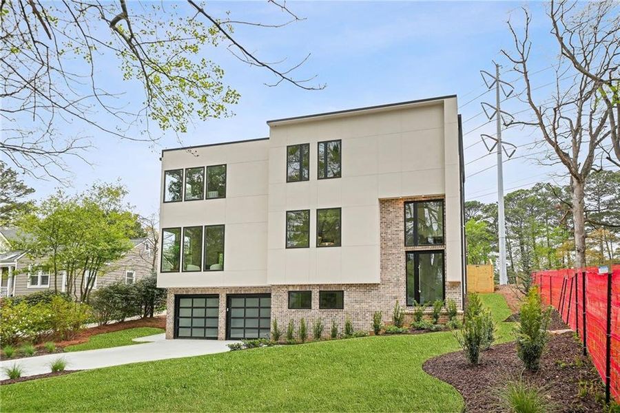 Front exterior of a new home in , Atlanta, GA, highlighting curb appeal (Image 31).