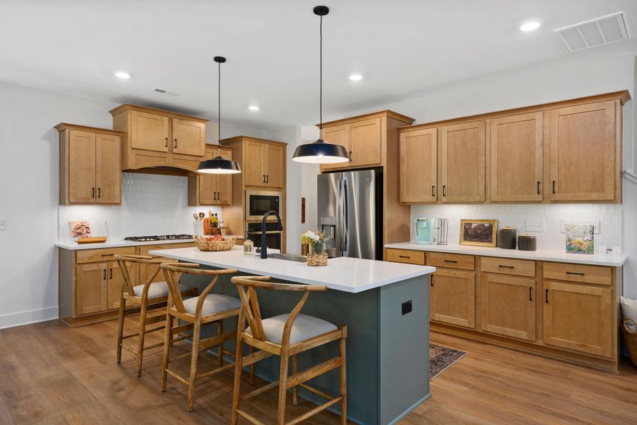 Representative furnished interior of a home built from the Lucky by Garman Homes in Golden Gate, High Point (Image 3).