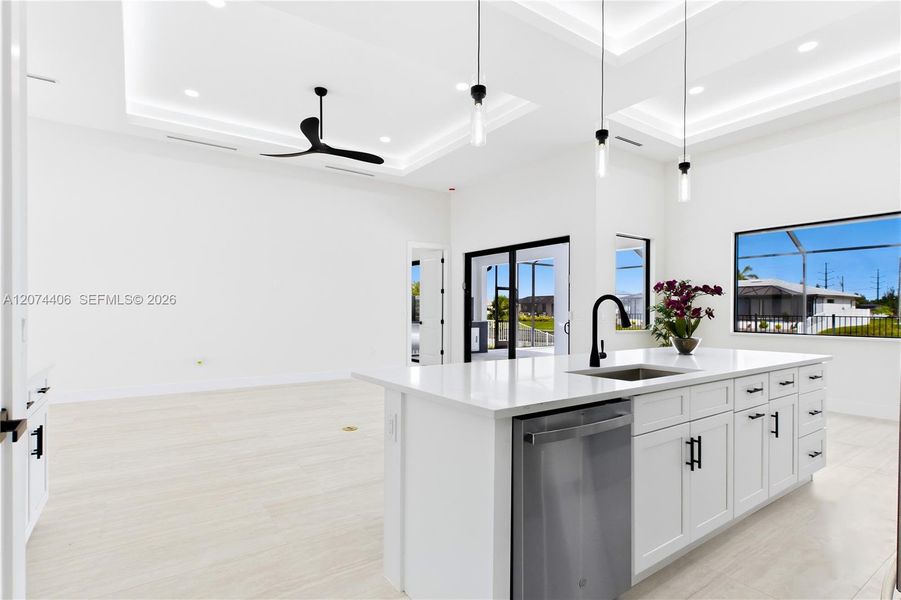 Oversized WATERFALL ISLAND w/ striking vertical WOOD SLAT DETAILING & abundant storage. Oversized WATERFALL ISLAND w/ striking vertical WOOD SLAT DETAILING & abundant storage.