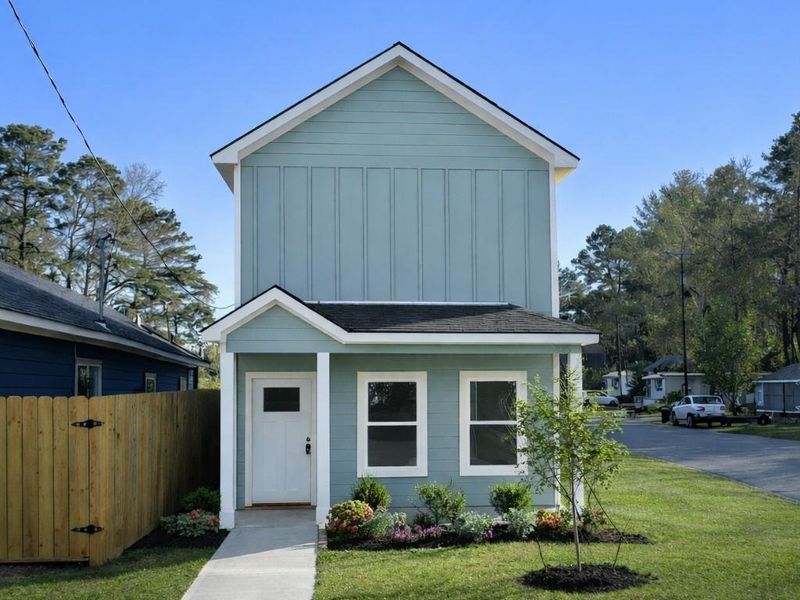 Front exterior of a new home in Lake Conroe Village, Montgomery, TX, highlighting curb appeal (Image 1). Front exterior of a new home in Lake Conroe Village, Montgomery, TX, highlighting curb appeal (Image 1).