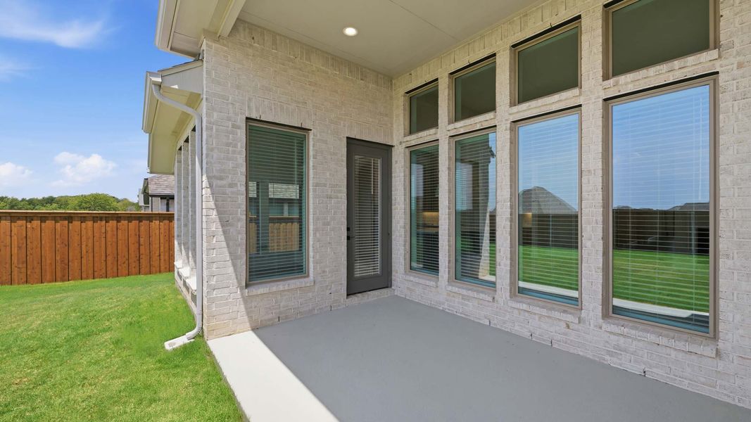 Exterior details and patio area of a home in Lakewood Village, Lakewood Village (Image 4).