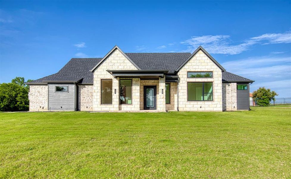 Front exterior of a new home in , Wills Point, TX, highlighting curb appeal (Image 24).