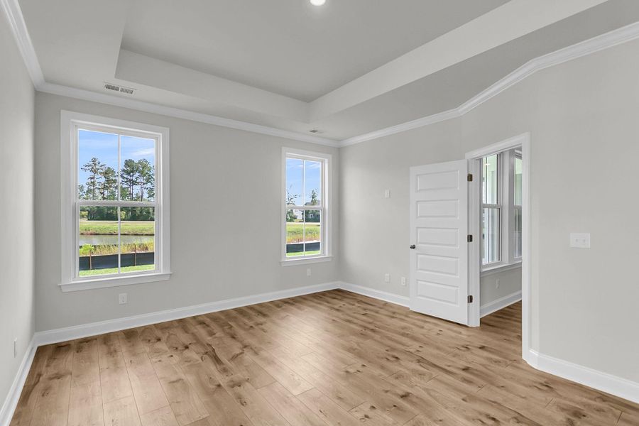 Spacious, unfurnished interior of a new home in Tidewater at Lakes of Cane Bay, Summerville (Image 25).