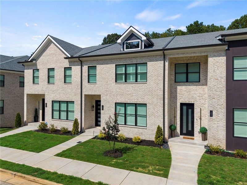 Front exterior of a new home in , Stockbridge, GA, highlighting curb appeal (Image 25).