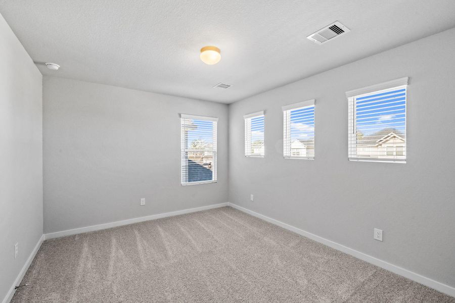 Spacious, unfurnished interior of a new home in Grand Oaks Village, Houston (Image 13).