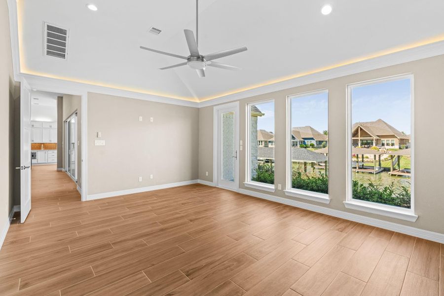 Another perspective of the primary suite showcasing its graceful proportions and direct access to the spa-inspired ensuite.