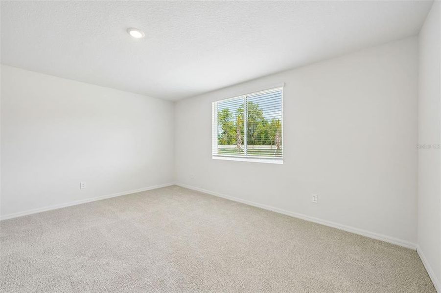 Spacious, unfurnished interior of a new home in Pine Ridge Meadows, Hudson (Image 41).