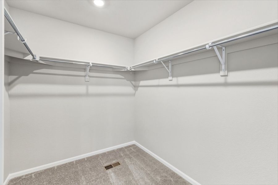 Spacious, unfurnished interior of a new home in Woodrose at Painted Prairie, Aurora (Image 17).