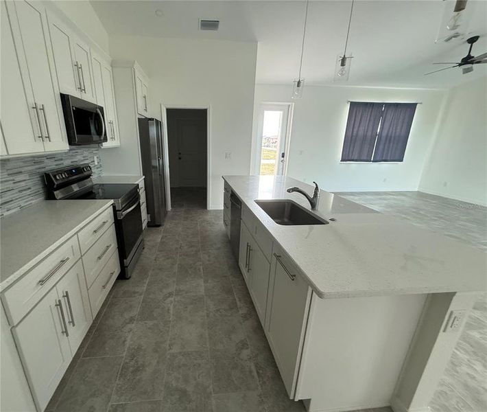 Furnished interior view inside a new home in , Cape Coral (Image 3).