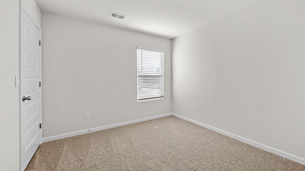 Representative unfurnished interior of a home built from the Edmon by D.R. Horton in Poplar Preserve, Newnan (Image 17).