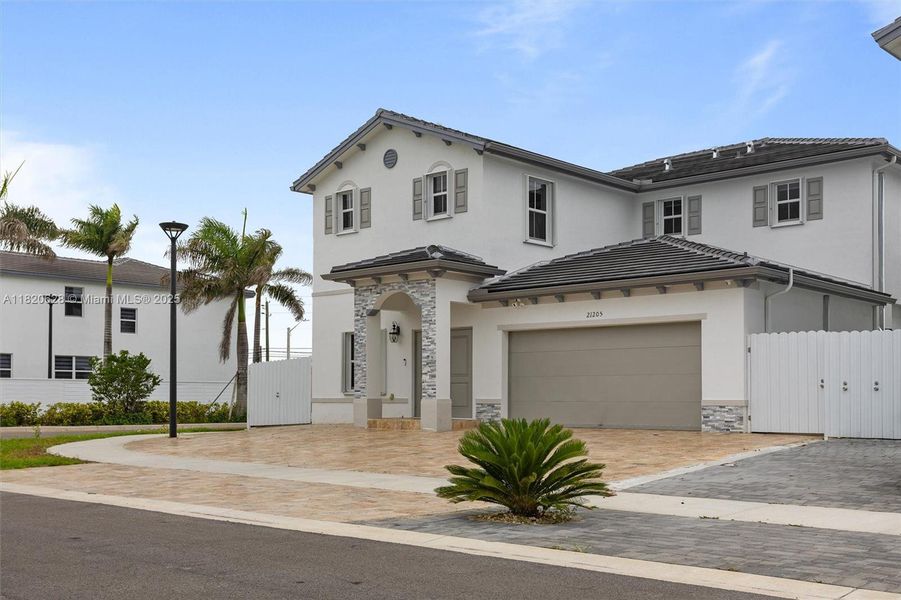 Front exterior of a new home in , Miami, FL, highlighting curb appeal (Image 2).