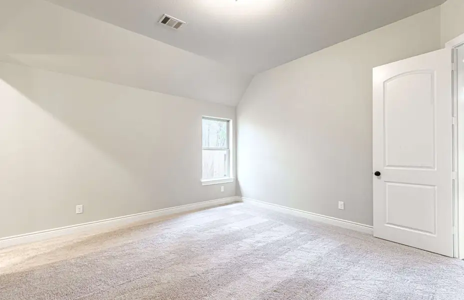 Representative unfurnished interior of a home built from the 3616 by Ravenna Homes in Artavia 70′, Conroe (Image 53).