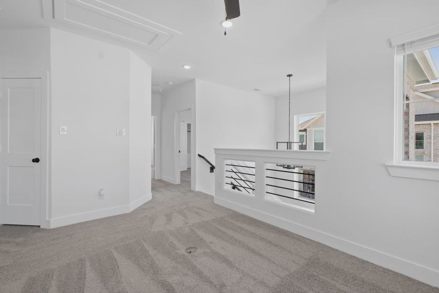 Representative unfurnished interior of a home built from the Dillon by Chesmar Homes in Sienna Courtyard, Missouri City (Image 30).