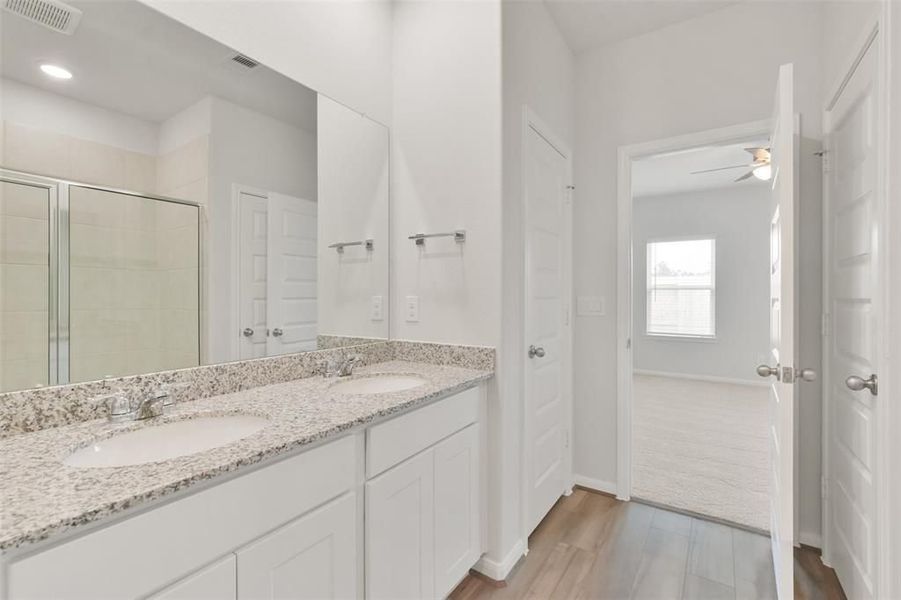 Furnished interior view inside a new home in Lakes at Black Oak, Magnolia (Image 22).