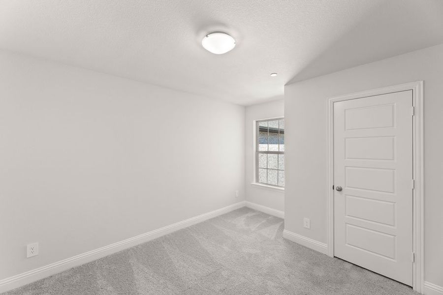 Front exterior of a new home in Main Street Village, Mansfield, TX, highlighting curb appeal (Image 25). Front exterior of a new home in Main Street Village, Mansfield, TX, highlighting curb appeal (Image 25).