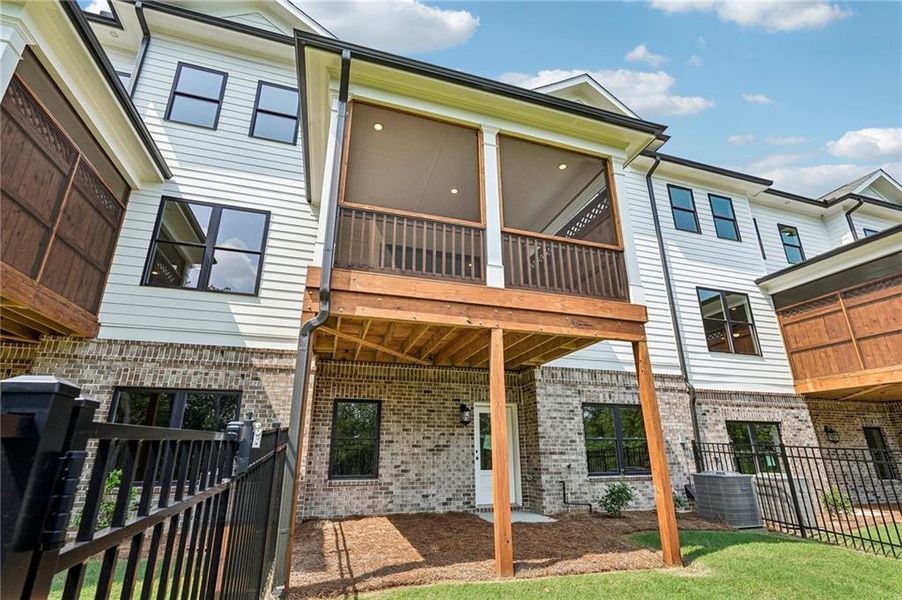 Exterior details and patio area of a home in Millcroft Townhomes, Buford (Image 31).