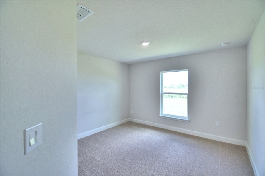 Spacious, unfurnished interior of a new home in Cadence Crossing, Auburndale (Image 27).