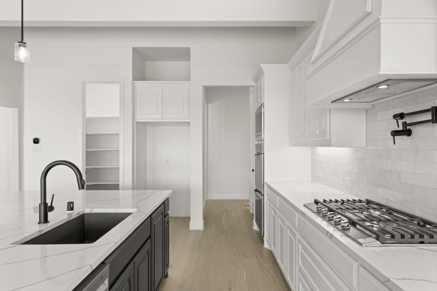 Representative furnished interior of a home built from the Somerset by Windsor Homes in Winding Creek, Rockwall (Image 11).