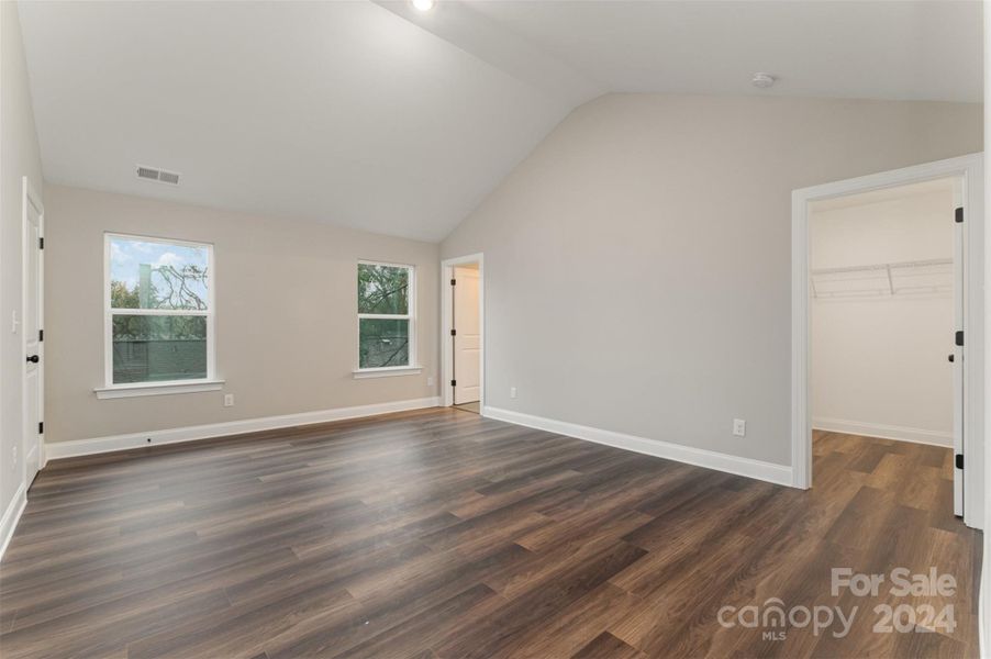 Primary Bedroom with tons of light and cathedral ceilings (Representative Photo)