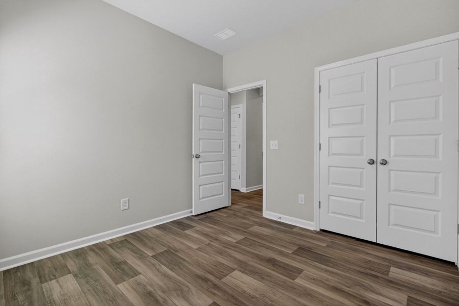 Spacious, unfurnished interior of a new home in Lindera Preserve at Cane Bay Plantation, Summerville (Image 19). Spacious, unfurnished interior of a new home in Lindera Preserve at Cane Bay Plantation, Summerville (Image 19).