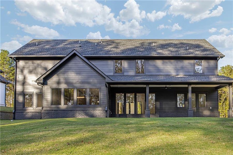 Front exterior of a new home in , Auburn, GA, highlighting curb appeal (Image 1).