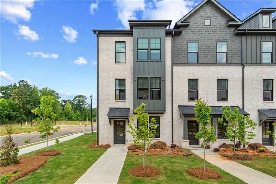 Front exterior of a new home in Silverock, McDonough, GA, highlighting curb appeal (Image 26).